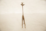 Slender legs and rich patina on the vintage African bronze giraffe.