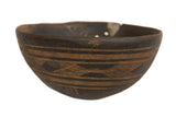 Vintage African Wooden Bowl, dark brown with light geometric etchings and aged patina.