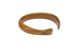 Collectible antique African copper bracelet, open C-shape, with a warm, aged patina.