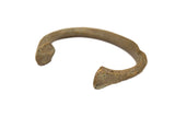 Vintage African bronze bracelet with time-worn patina and unique organic form.