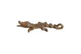 Vintage African bronze crocodile pendant with a handmade texture and aged patina.