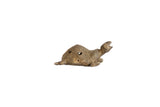 Vintage African bronze turtle pendant with head raised and a circular wire design shell.