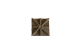 Vintage African square bronze coin with star pattern and natural patina.
