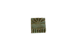Vintage African square bronze coin with a geometric stamp design and oxidized patina.