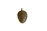 Vintage African bronze mask pendant with a textured finish and braided details.