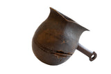 Antique African wooden pitcher with a rounded body, flared spout, and rich, aged patina.