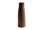 Antique African tall wooden vase, dark brown, with early 20th century handmade rustic texture.