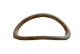 Antique African bronze artifact with a curved, handmade shape and rustic, aged patina.