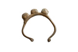 Vintage African bronze bell cuff bracelet with three rounded bells and a timeworn bronze patina.