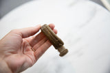 Hand-forged stripe design and textured antique patina on an African bronze cuff.