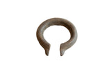 Antique African bronze cuff bracelet with a heavy, rustic patina and etched details.