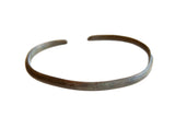 Antique African bronze bracelet with a simple open cuff and time-worn patina.