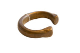 Antique African bronze snake cuff bracelet with a hand-forged shape and aged patina.