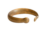 Antique African bronze snake cuff bracelet with a stylized form and a time-softened patina.