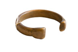 Antique African bronze snake cuff bracelet with a thick, handcrafted form and aged patina.