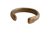 Antique African bronze snake cuff bracelet with a heavy, handcrafted form and aged patina.