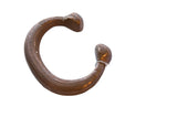 Antique African copper alloy snake cuff bracelet with a rich patina and textured details.