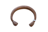 Antique African copper snake cuff bracelet with hand-etched patterns and a warm, aged patina.