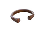 Antique African copper snake cuff bracelet with a solid, open-cuff design and matte patina.