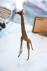 Bronze giraffe sculpture, handmade with unique surface texture and warm aged patina.