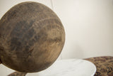 Aged dark brown wood texture and natural imperfections on the vintage African bowl.