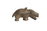 Vintage African bronze hippo sculpture with a rustic, handmade texture and dark patina.