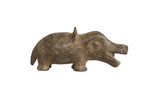 Vintage African bronze hippo sculpture with a rustic, handmade texture and earthy patina.