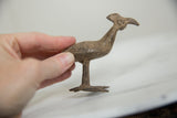 Vintage African bronze Kori bustard bird held in hand to show scale and texture.