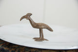 Side view of a vintage African bronze bustard bird, highlighting its textured, handmade finish.