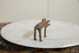 Rear view of the vintage African bronze warthog, highlighting its handmade form.