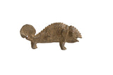 Vintage African bronze chameleon with a textured, patinated finish and a tightly coiled tail.