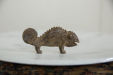 Handmade bronze chameleon with textured scales, detailed eye, and open mouth.