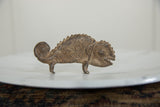 Vintage African bronze chameleon sculpture, detailed profile view of textured scales.