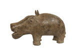 Vintage African bronze hippo figurine with a rustic and textured patina.