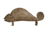 Vintage handmade African bronze chameleon with a textured body and distinctive coiled tail.