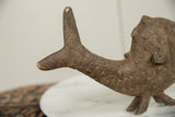 Hand-etched scales and aged bronze patina on the tail section of the vintage fish sculpture.