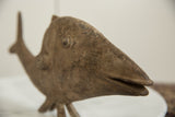 Angled close-up of the vintage bronze fish head, showing its aged, textured surface patina.