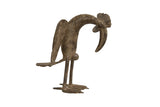 Vintage African bronze bird sculpture with a stylized form and weathered, textured patina.