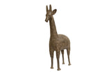 Vintage African bronze giraffe figure with an aged patina and etched concentric circles.