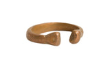 Antique African copper snake bracelet with a thick, open-cuff design and a warm patina.