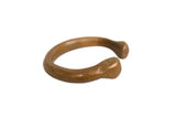 Antique handmade African copper snake bracelet with a stylized head and aged patina.