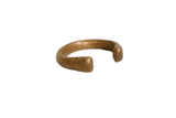 Antique African copper snake bracelet with a heavy, C-shaped cuff and a warm, aged patina.