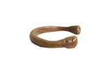 Antique African copper snake bracelet with a warm patina and a hand-etched serpent head.
