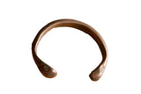 Antique African copper snake cuff bracelet with a simple, hand-formed shape and warm patina.