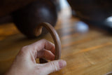 Hand-etched details and aged copper texture of an antique snake cuff bracelet.