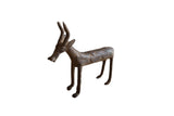 Vintage African bronze antelope sculpture, dark aged patina, with etched body patterns.