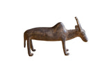 Vintage handmade African bronze zebu sculpture with a rustic, dark patina.