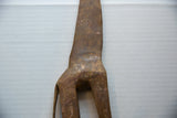 Etched patterns and rustic texture on the body of the handmade bronze giraffe.