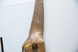Aged bronze patina and detailed hand-etched pattern on the giraffe's neck.
