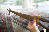 Weathered patina and hand-formed details on the vintage African bronze giraffe.